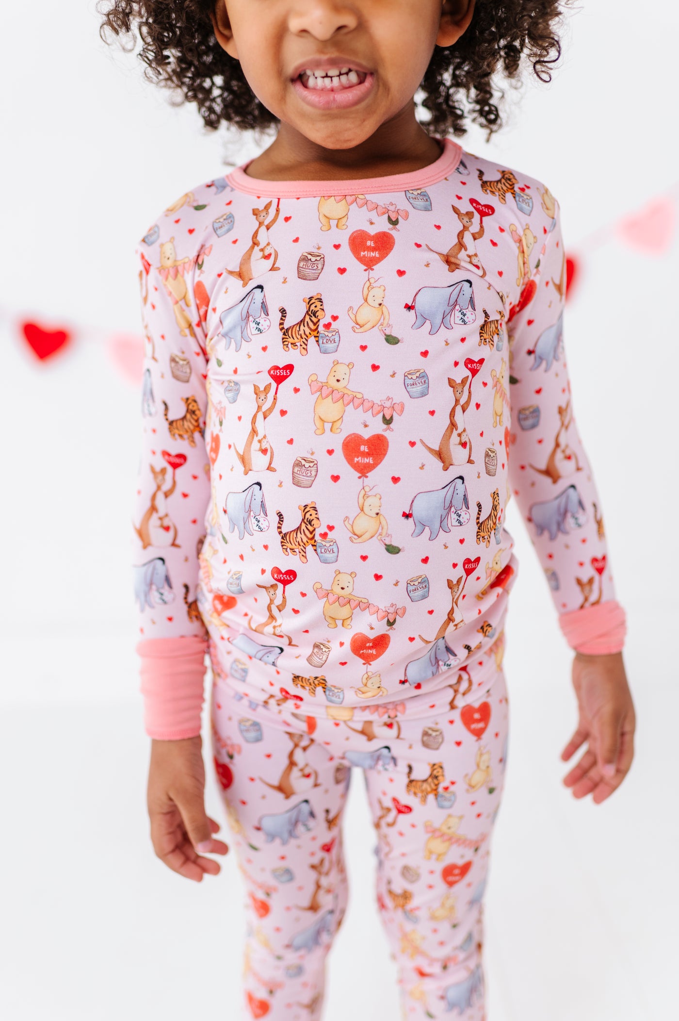 Shop The Sleepy Sloth 100 ACRES OF KISSES Winnie the Pooh Print Two Piece Jammies Pajamas at Purple Owl Boutique